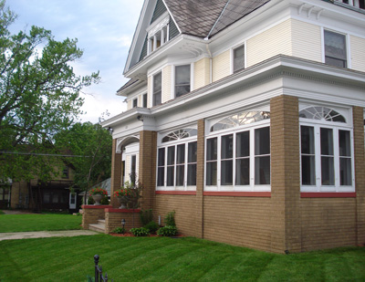 Wrap around Porch Enclosed and Columns replaced by Brick