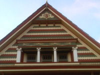 Painted Lady Gable with Ionic Scamozzi Column Capitals