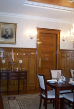 Formal Victorian Dining Room with Oak Wainscoting and Tray Ceiling