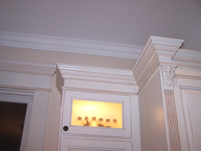 Egg and Dart Crown Moulding on ceiling window mantel and cabinet risers